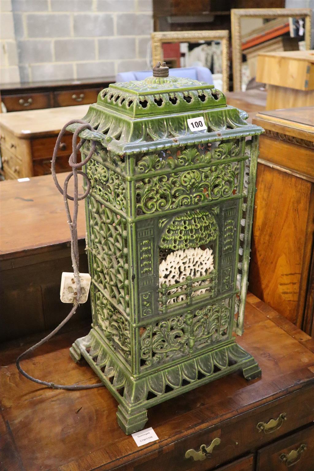 A French green enamelled cast iron heater, 60cm high